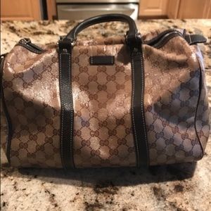 Brown and black Gucci leather tote